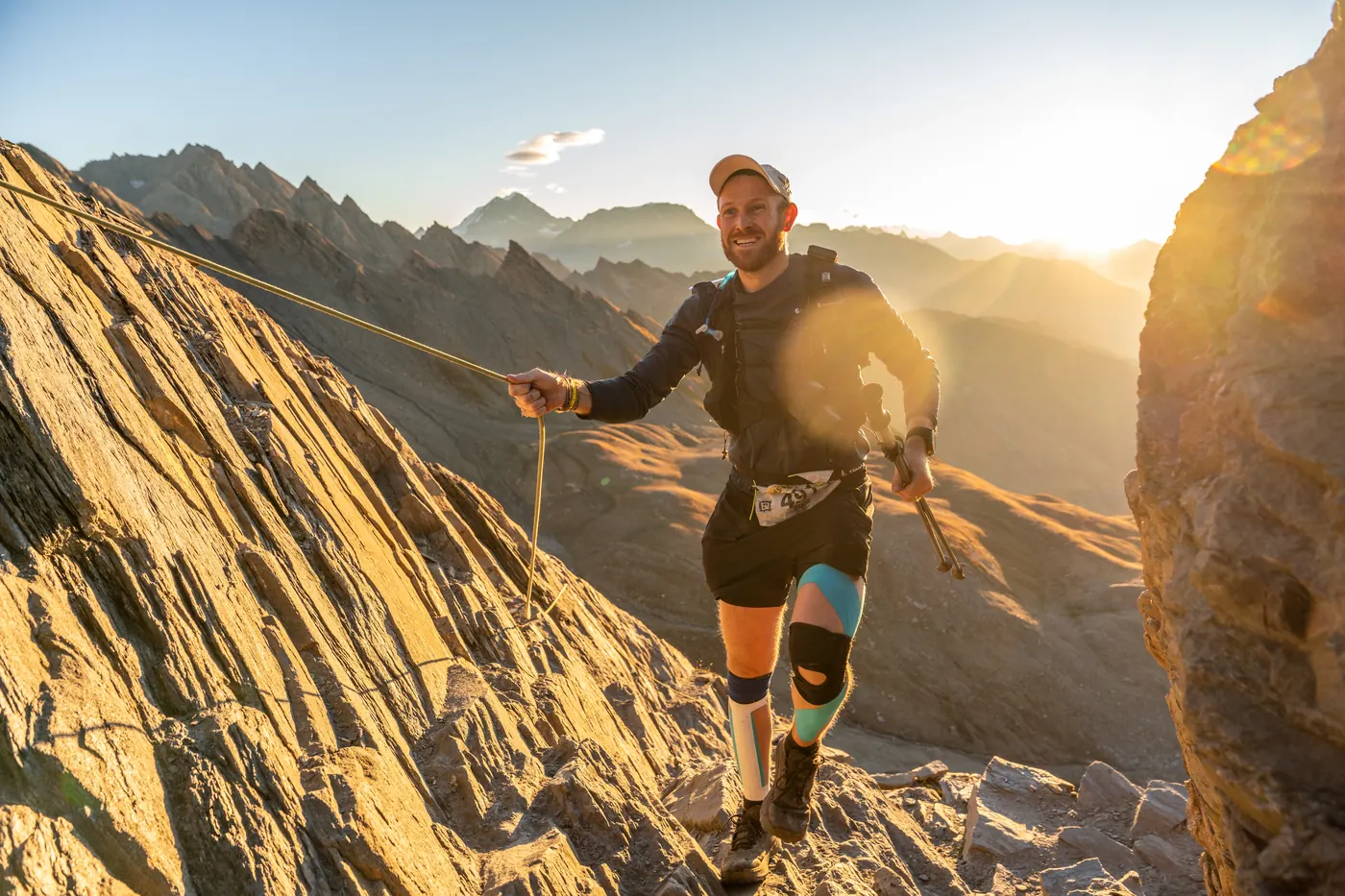 Joshua Coldray climbing a fixed rope in the Italian Alps during TOR 330
